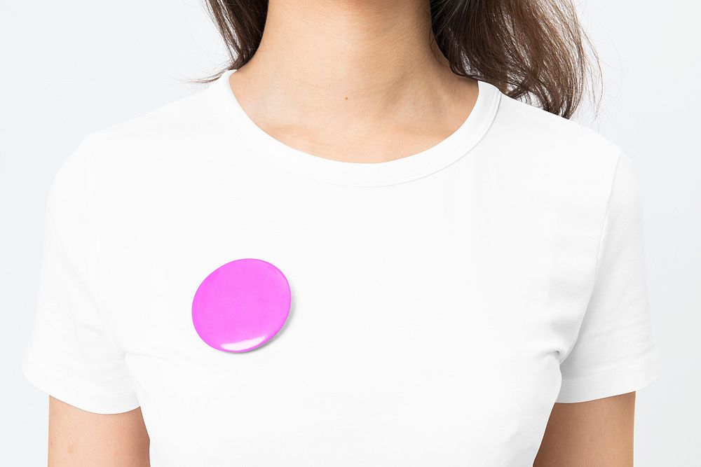 Pink pin button mockup psd on white t-shirt