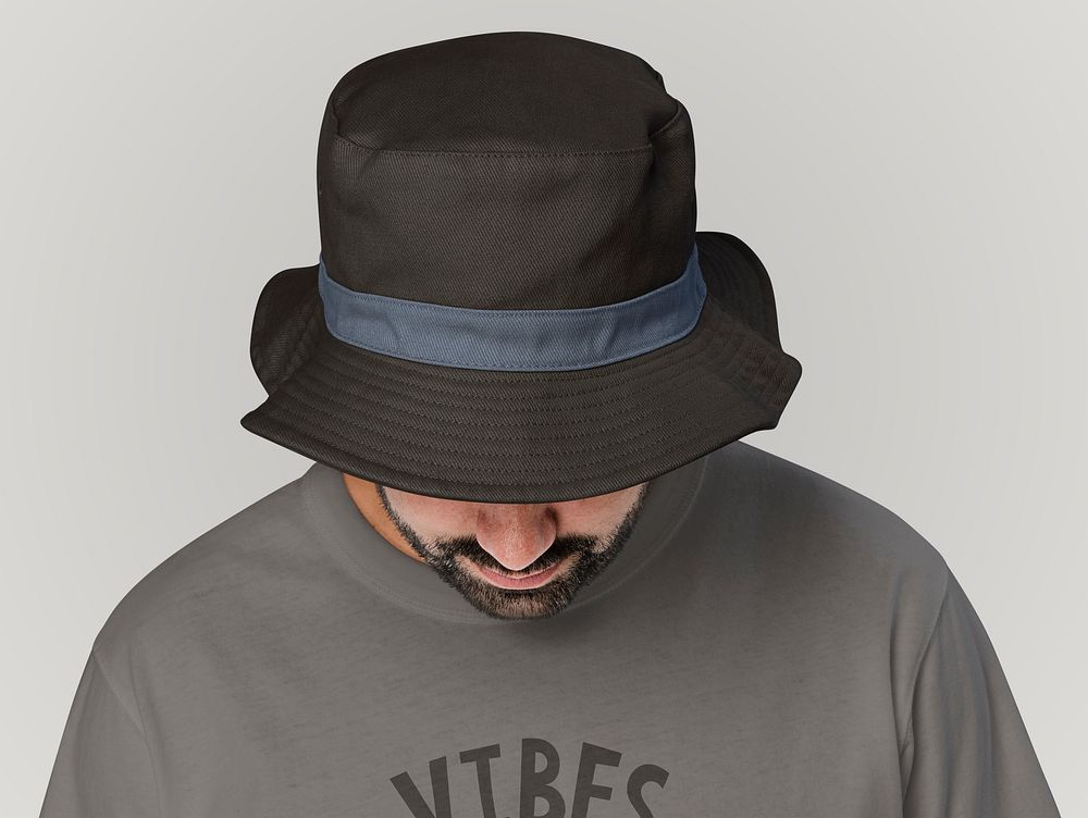 Man wearing bucket hat with minimal design