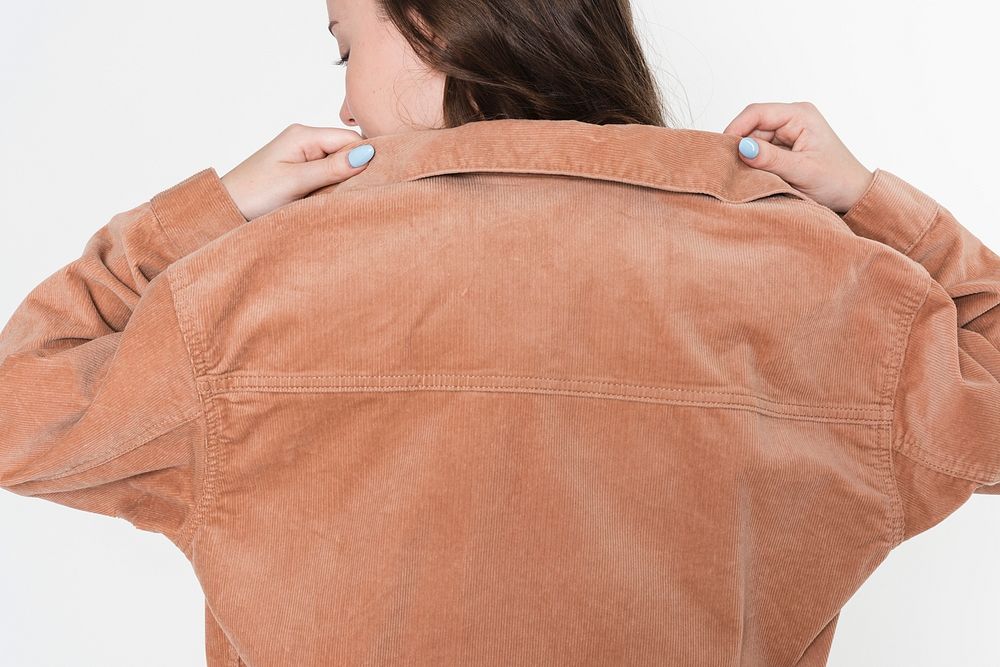Png brown jacket mockup for street fashion photoshoot rear view