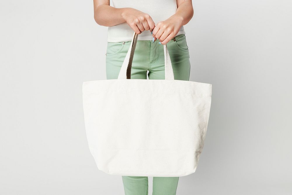 Woman with white tote bag