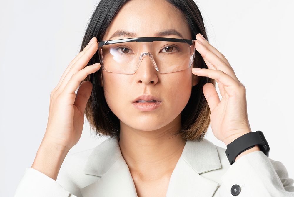 Businesswoman wearing AR glasses/AR smart glasses/smart glasses  futuristic technology