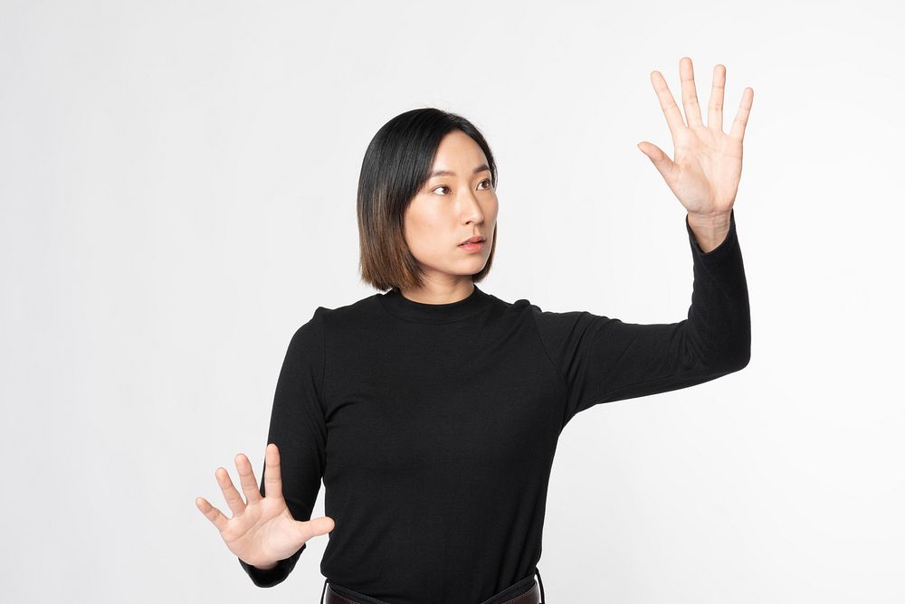 Businesswoman touching invisible screen future technology