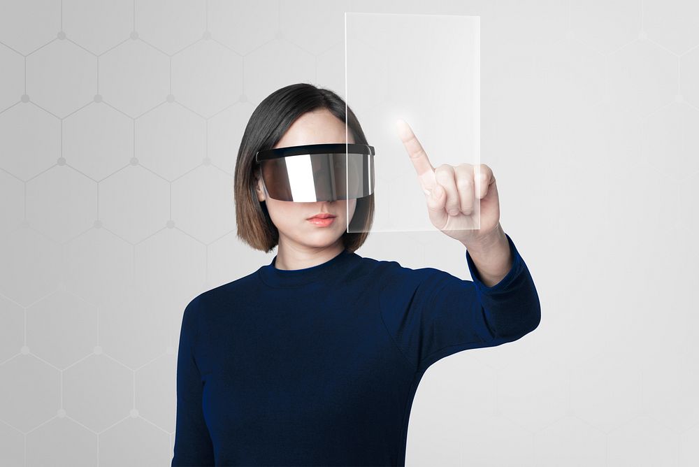 Woman wearing smart glasses mockup touching virtual screen psd futuristic technology