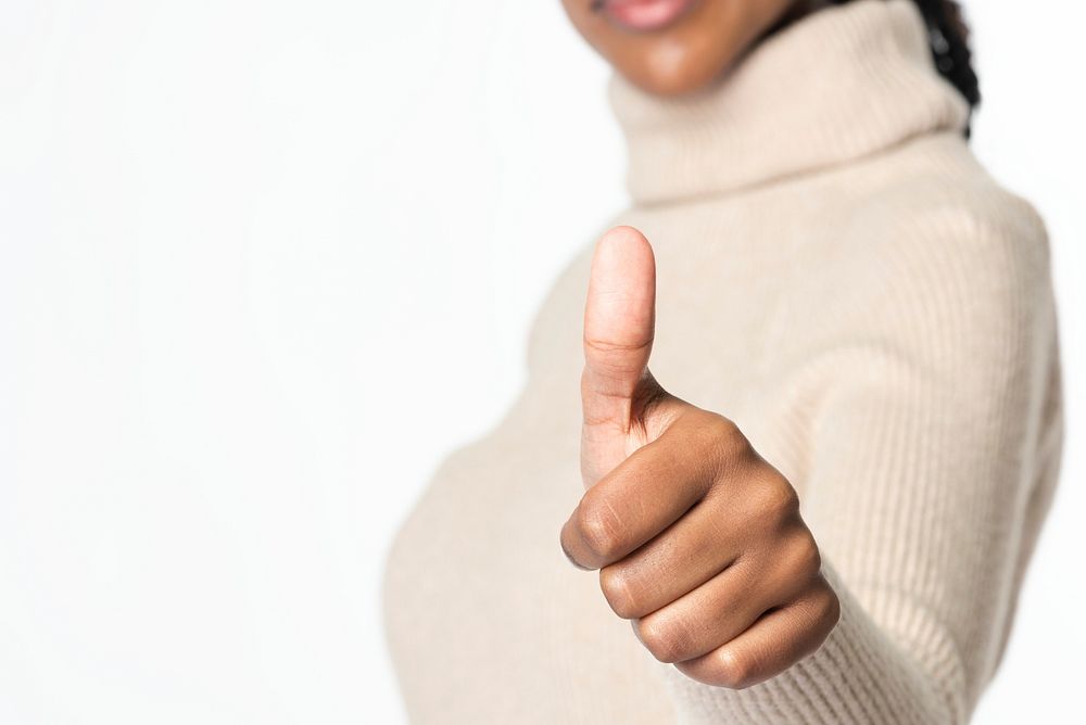 African american woman showing thumbs up