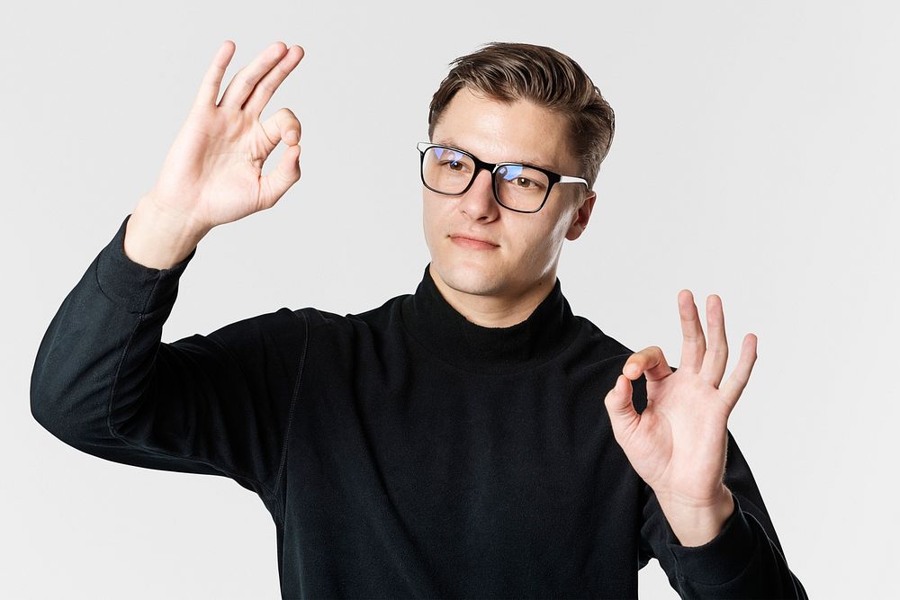Man wearing smart glasses psd with zooming hand gesture mockup