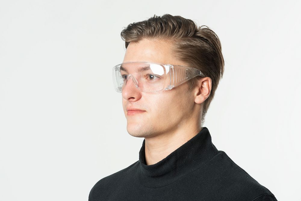 Man wearing transparent safety goggles