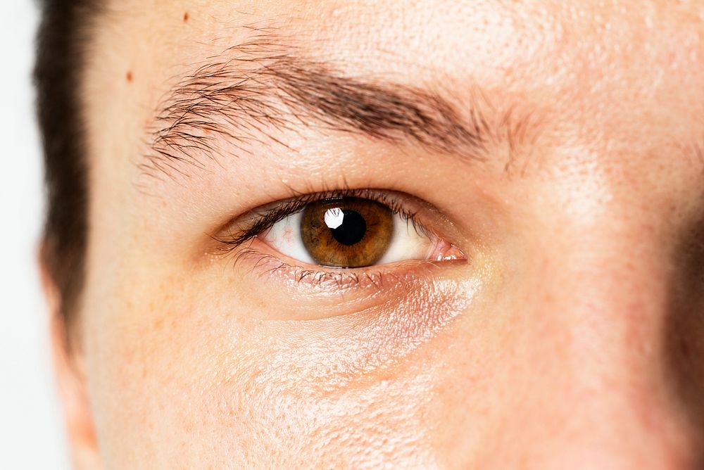 Man with smart brown eye color