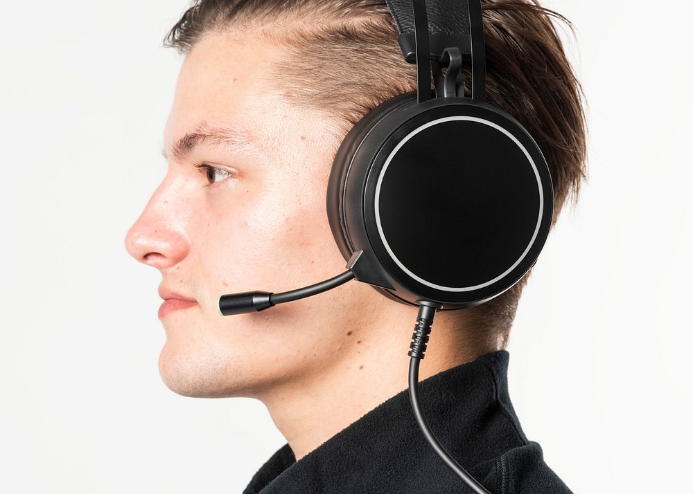 Male telemarketer with a black headset