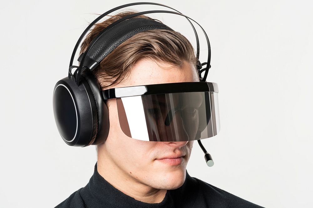 Man with smart glasses mockup and headphones psd futuristic technology