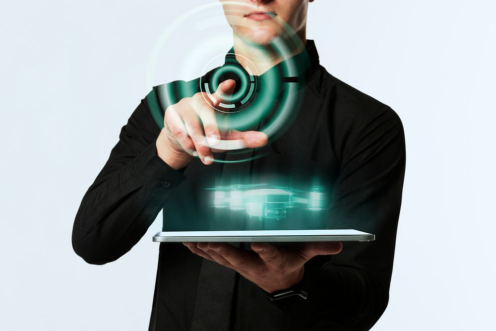 Man touching holographic screen mockup from a tablet psd futuristic technology