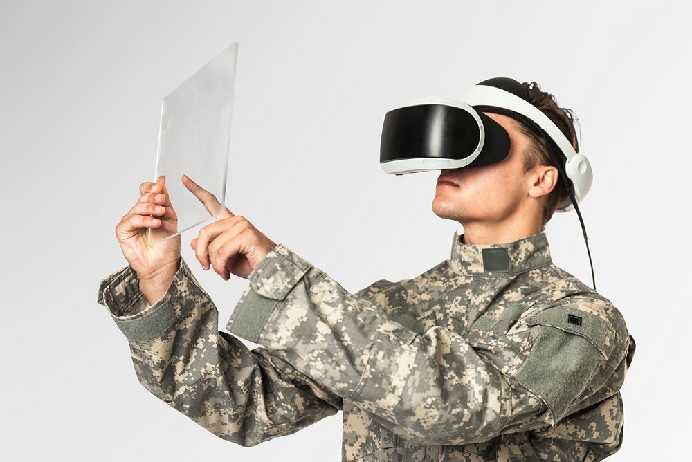 Military using transparent tablet with VR headset