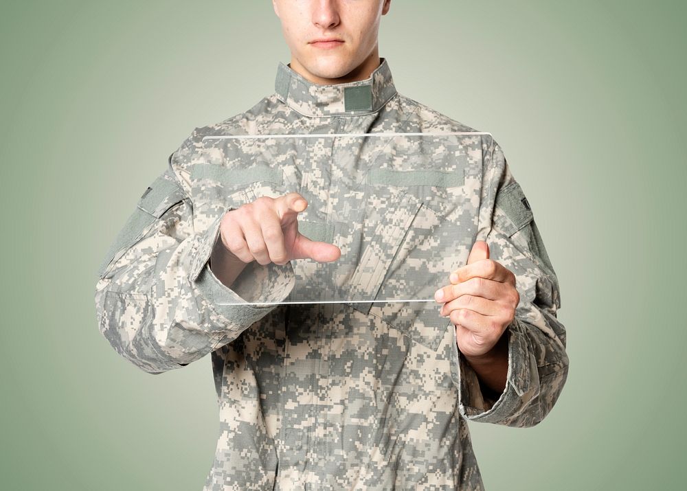 Military man using transparent tablet mockup psd