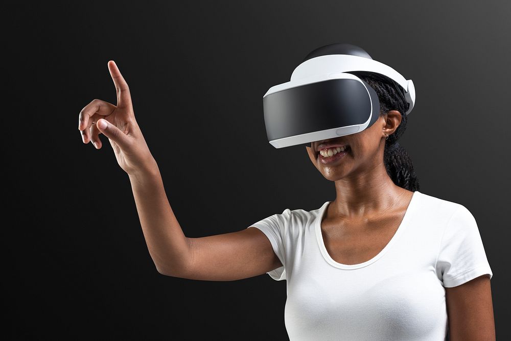 Woman with VR headset touching invisible screen futuristic technology