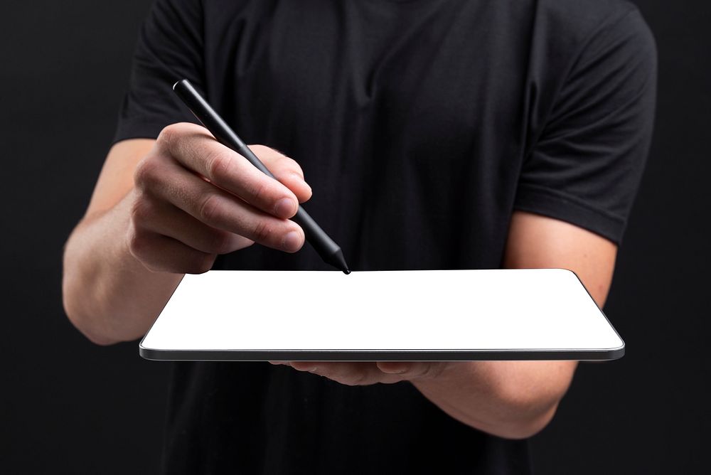 Businessman holding tablet and writing on screen with stylus social media cover