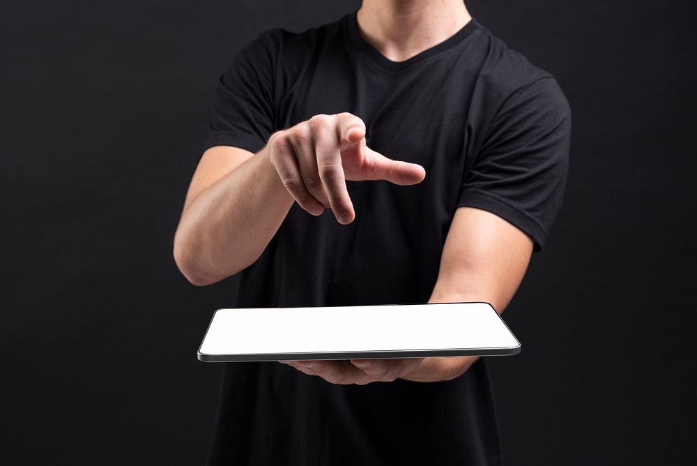 Businessman holding tablet and writing an invisible screen with stylus social media cover
