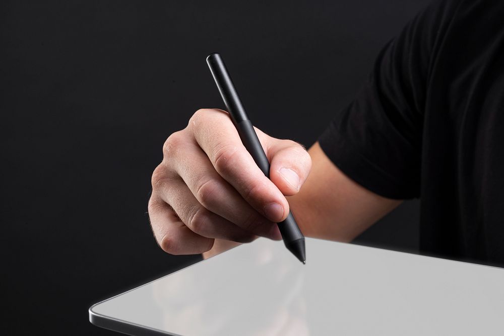 Businessman holding tablet and writing on screen with stylus social media cover