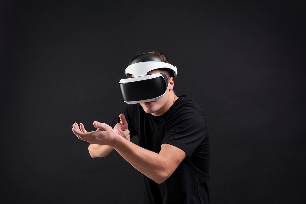 Man using virtual reality gadget for entertainment
