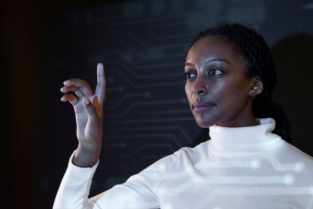 Woman touching virtual screen futuristic technology
