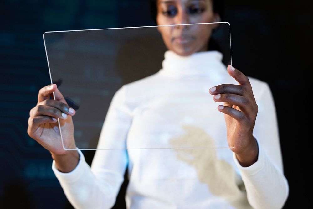 African American woman using virtual screen smart technology