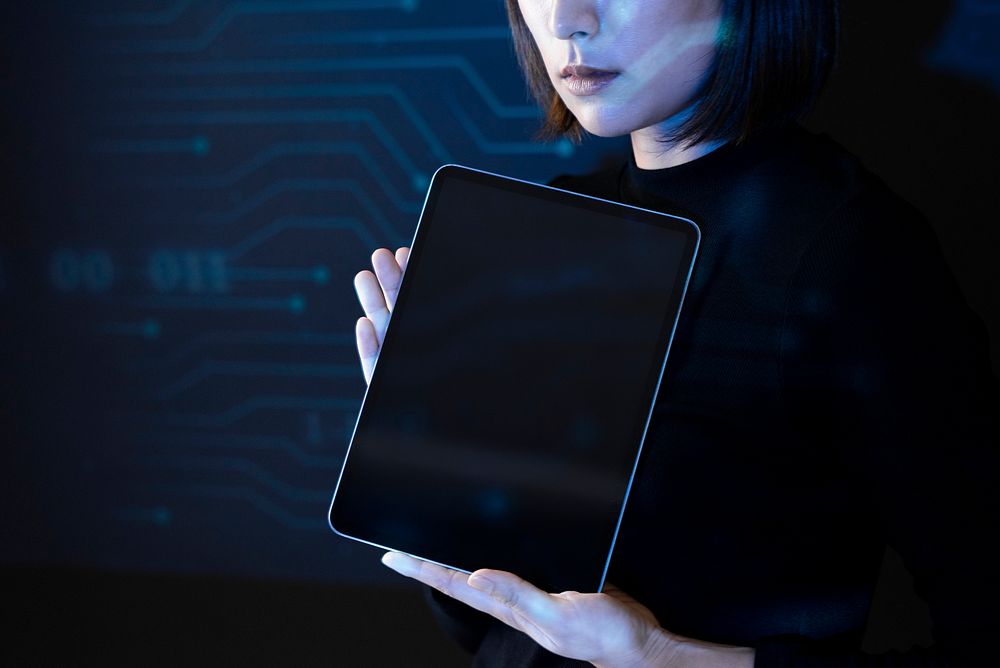 Asian woman showing blank screen tablet innovative future technology