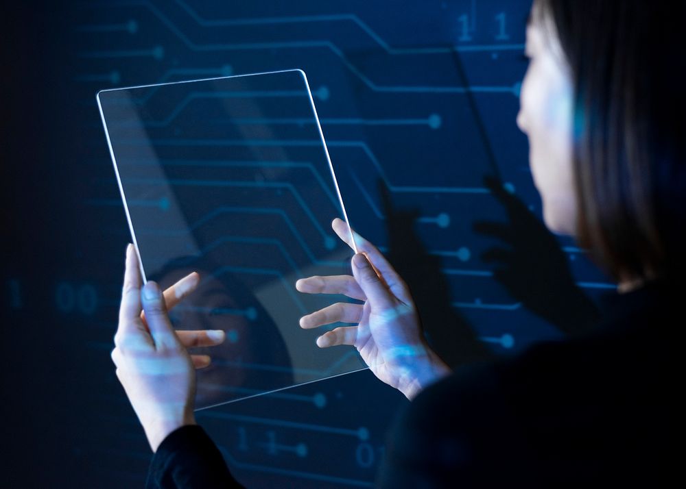 Businessman holding transparent tablet innovative future technology