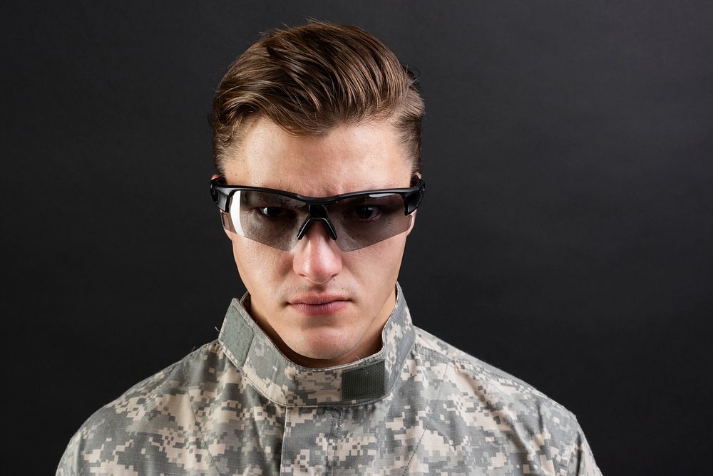 Young military man wearing smart glasses