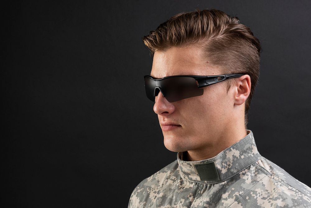 Young military man wearing AR smart glasses