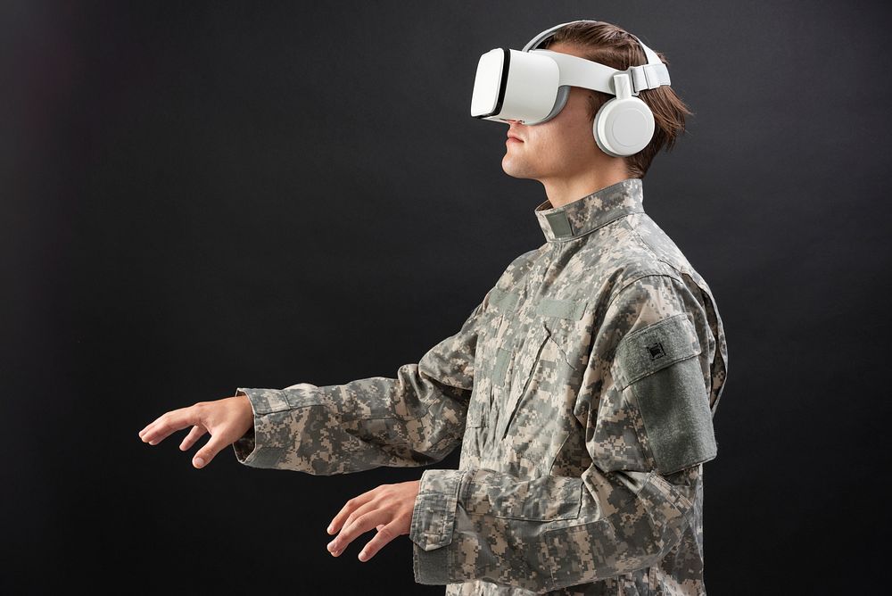 Military man with VR headset in training military technology