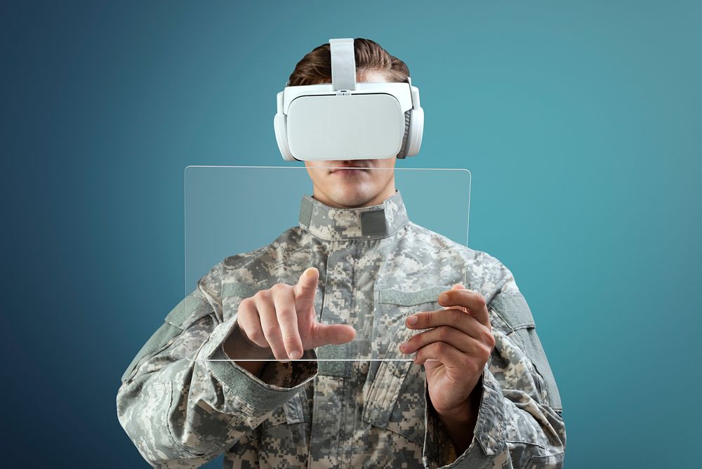 Military using transparent tablet with VR headset