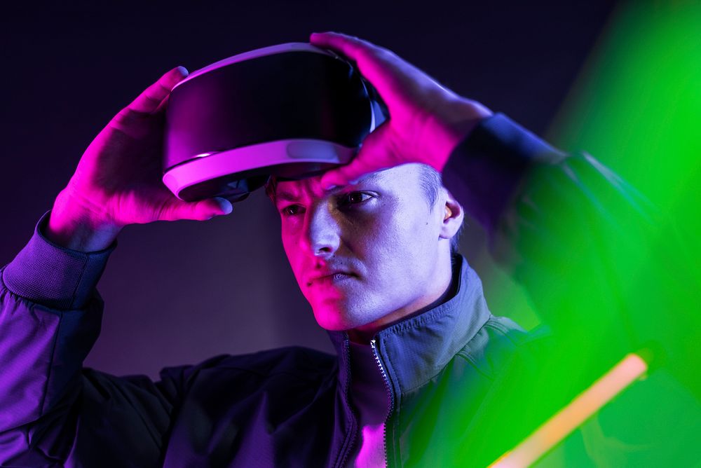 Man having virtual reality experience using VR headset