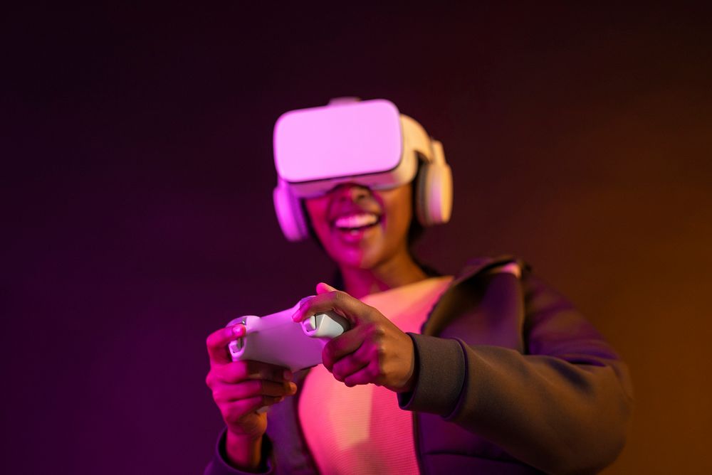 Woman playing game with VR headset virtual reality experience