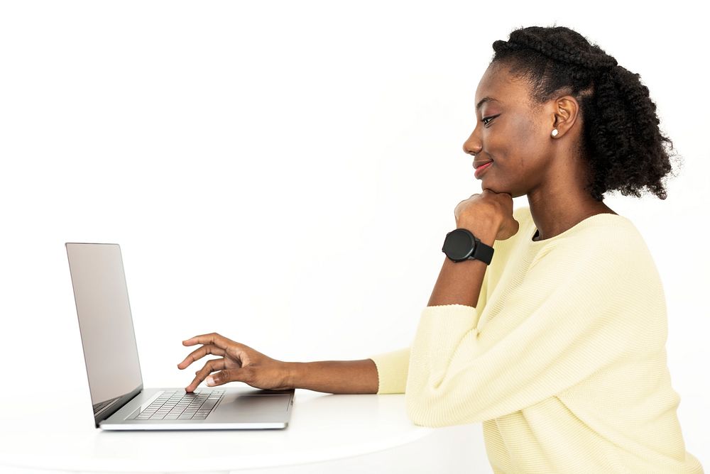 African American woman working on laptop