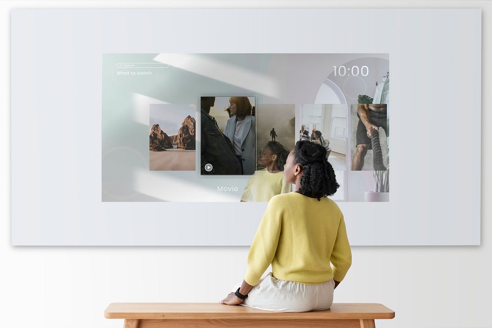 Woman with projector wall mockup psd rear view