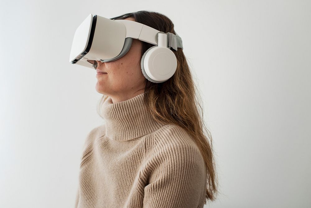 Woman experiencing VR simulation entertainment technology