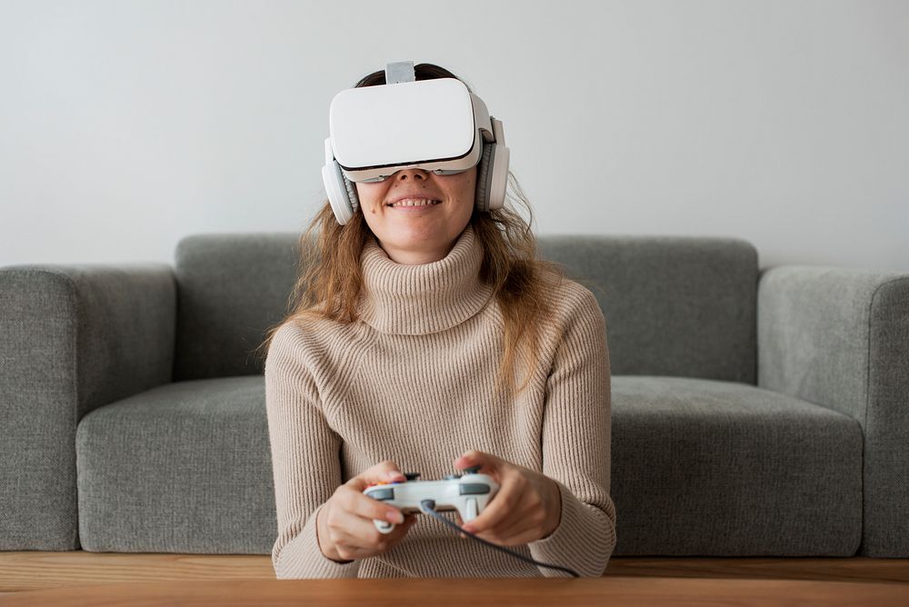 Woman in VR headset playing game