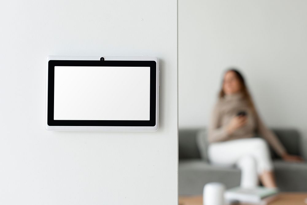 Home automation panel monitor mockup psd on a wall