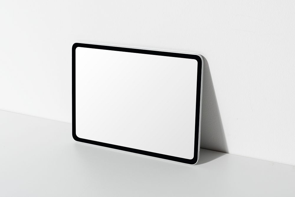 Digital tablet screen mockup psd lean on the wall