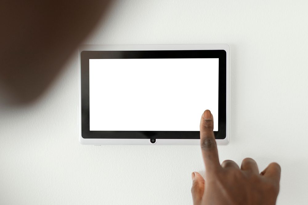 Home automation panel monitor mockup psd on a wall