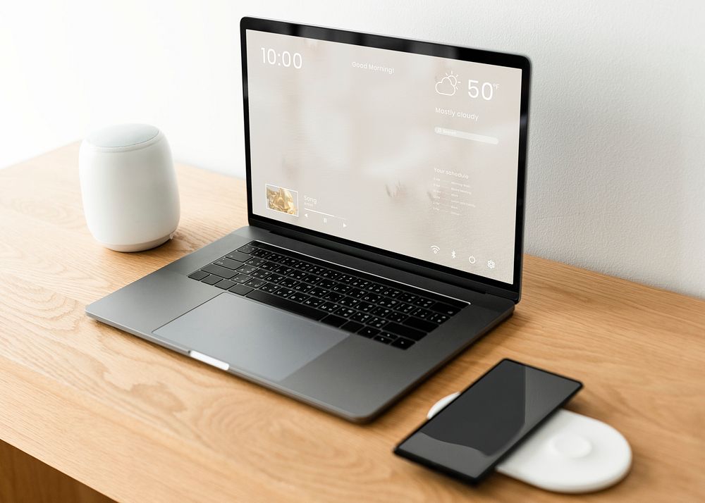 Laptop screen mockup psd on a wooden table