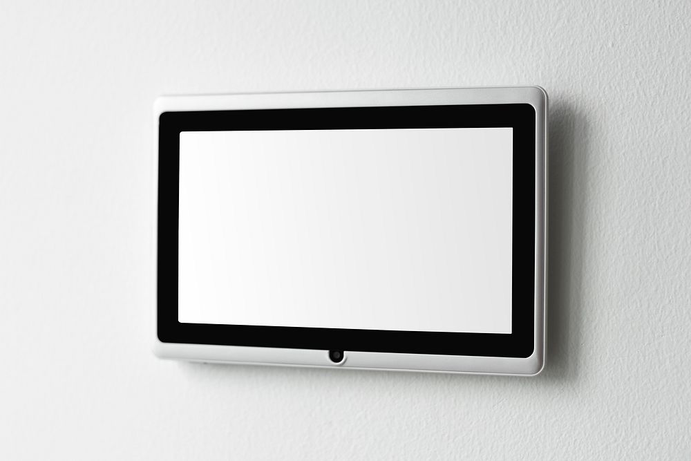 Home automation panel monitor mockup psd on a wall