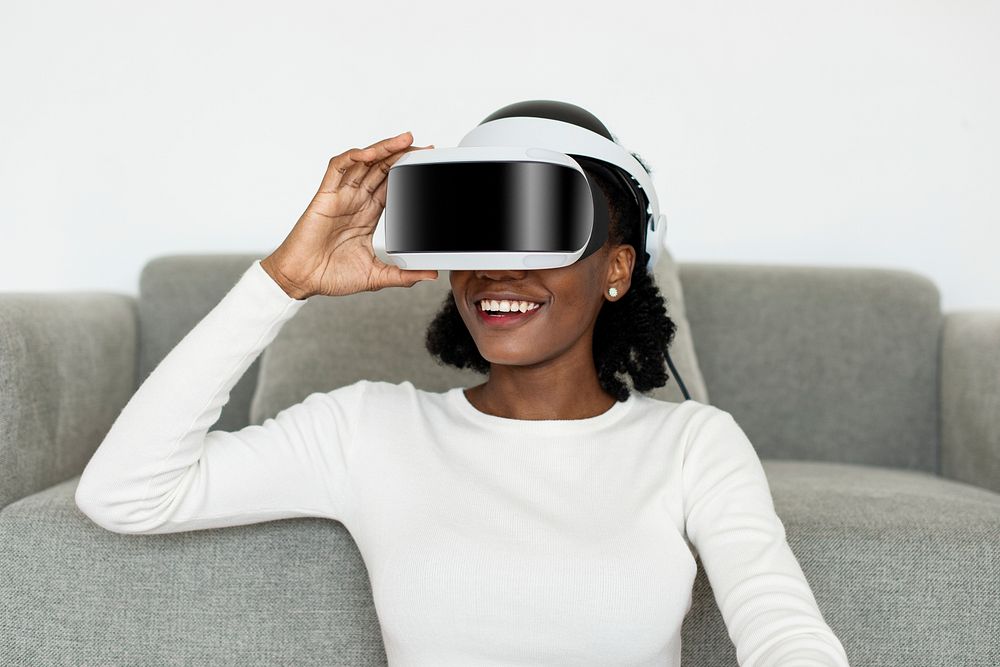 African American  woman experiencing VR simulation