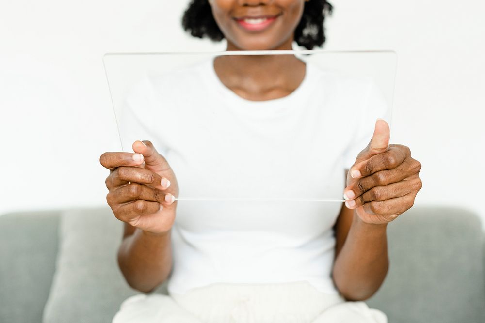 Transparent tablet screen mockup psd with woman innovative technology