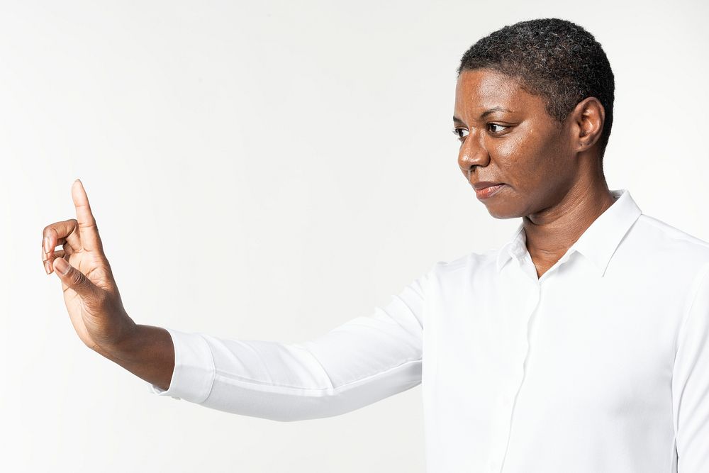 Woman pressing on virtual screen hand gesture