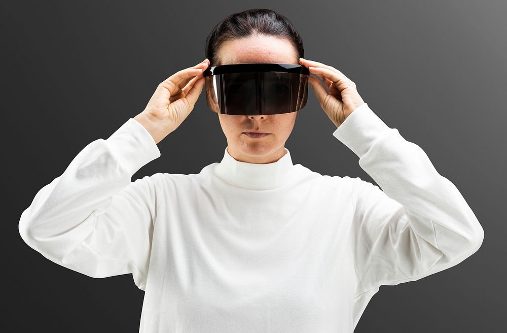 Woman with black shield glasses portrait