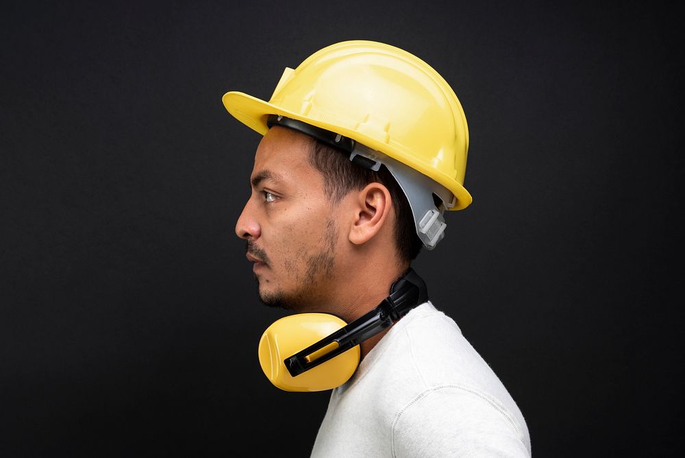 Civil engineer with hard hat and earmuff