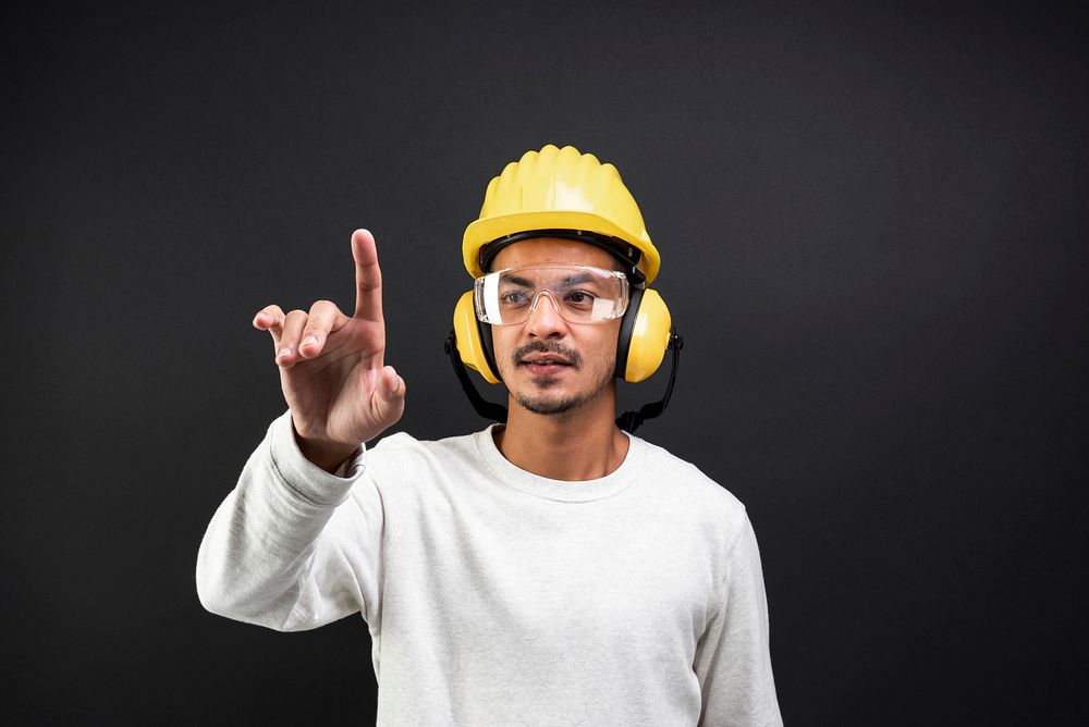 Civil engineer with safety glasses and hard hat