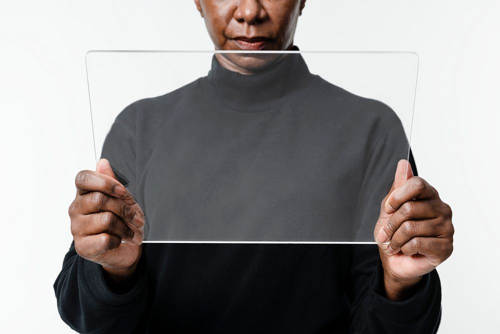 Woman using transparent tablet innovative technology
