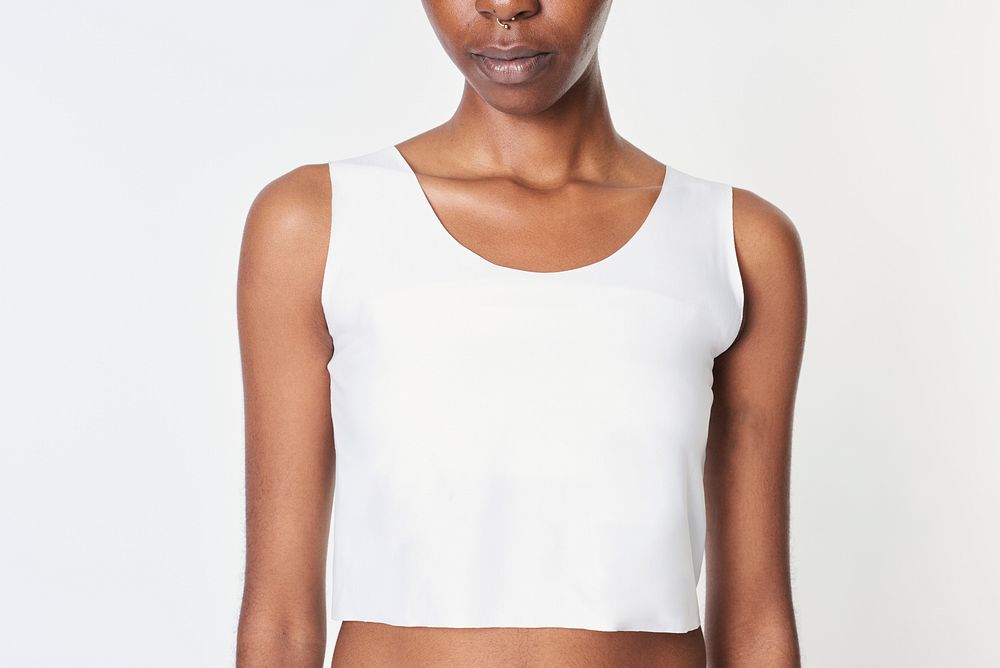 Black woman in a white cropped top 