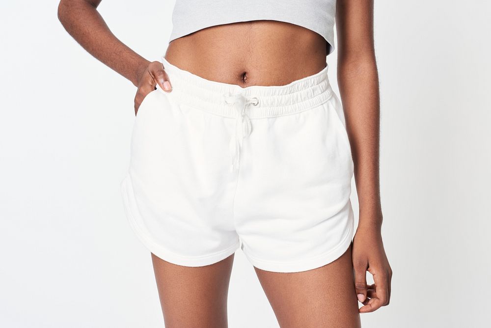 Black woman wearing white front tie shorts