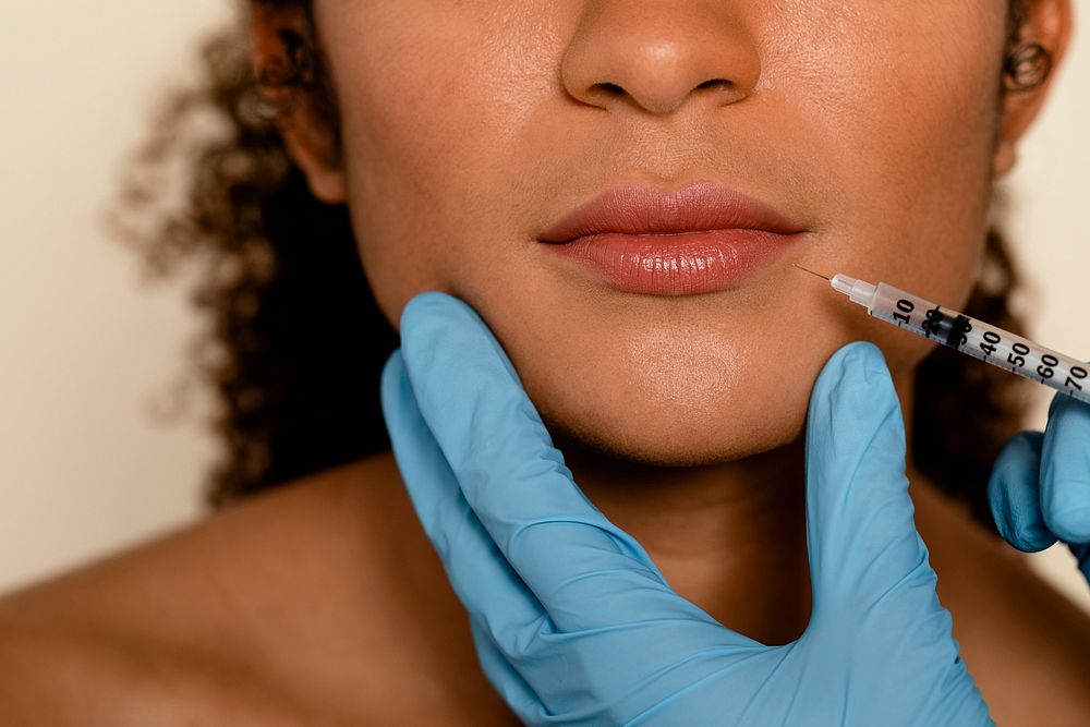 Lip filler, injectable beauty treatment at clinic 